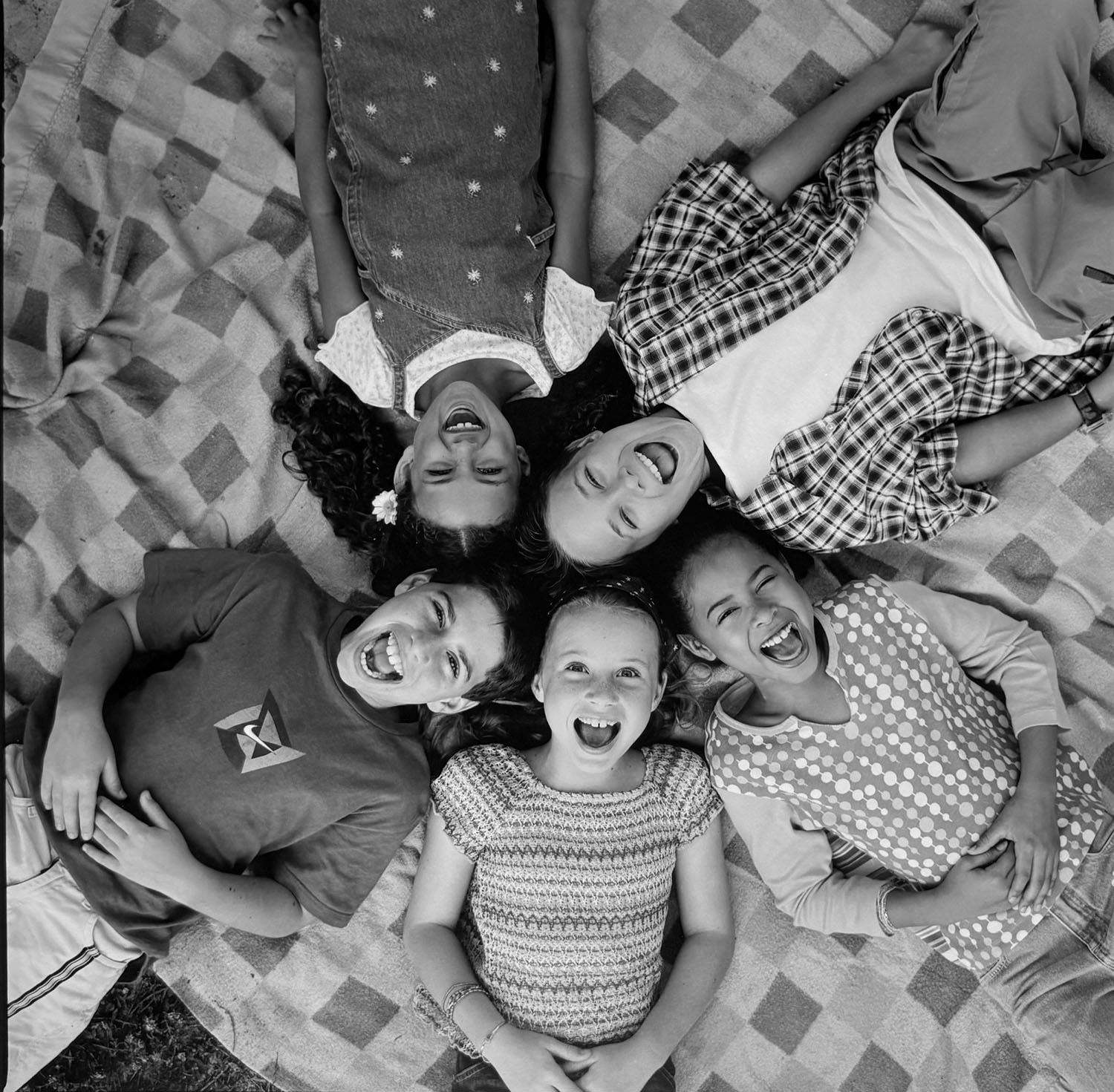 Florida Lottery campaign — six children lying on blanket